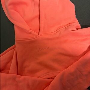 Super cropped coral hoodie by DFYNE
